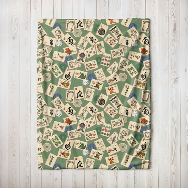 Scattered Mahjong Tiles Blanket on Green