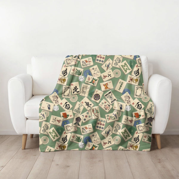 Scattered Mahjong Tiles Blanket on Green