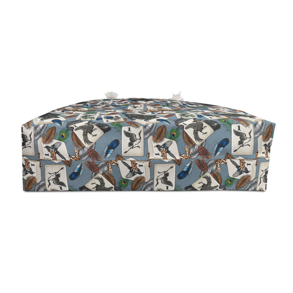 Carry all tote bag with bird and feather pattern on a white background bottom view