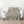 Flower Garden Blanket pattern laid out on a wooden floor.