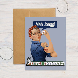 Rosie Mah Jongg Greeting Card holding a mah jongg tile, with the text 'Mah Jongg!' above. The card comes with a brown envelope.