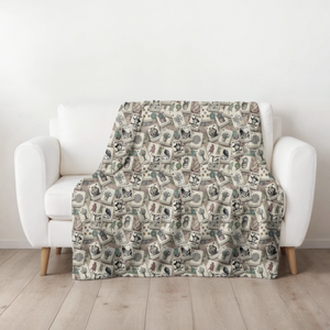 Southwestern Desert Mah Jongg Blanket, draped over a white armchair
